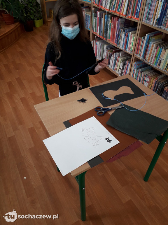 Tosia w bibliotece