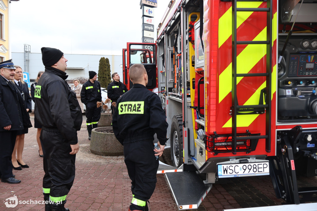 Wozem strażackim na sesję