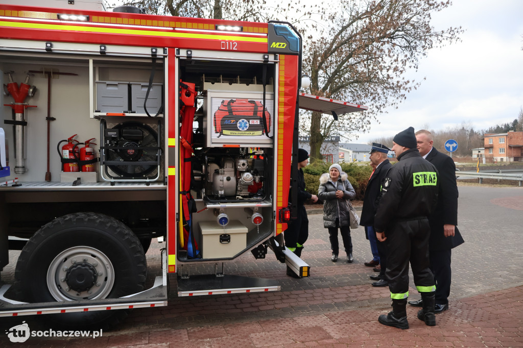 Wozem strażackim na sesję