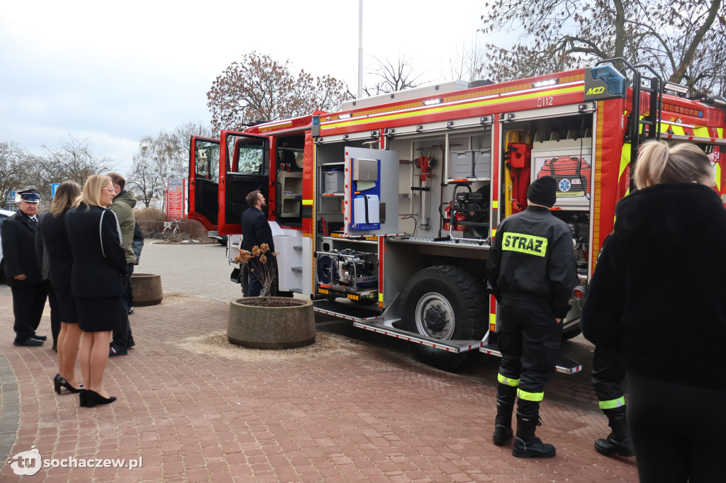 Wozem strażackim na sesję