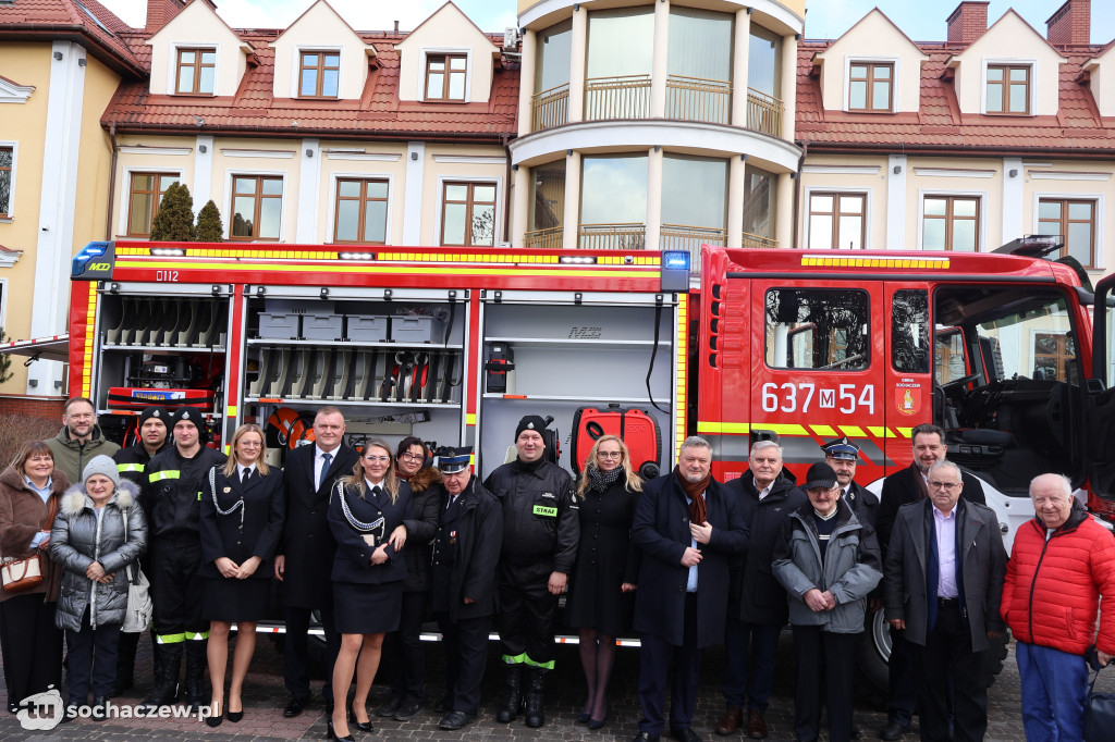 Wozem strażackim na sesję