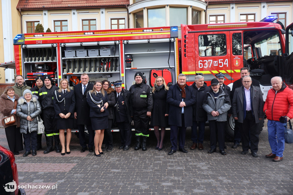 Wozem strażackim na sesję